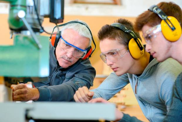 Workers and trainees at work