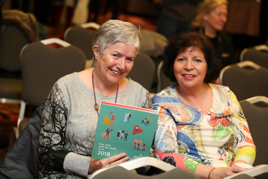 2 female attendees to NALA conference holding 2018 NALA report