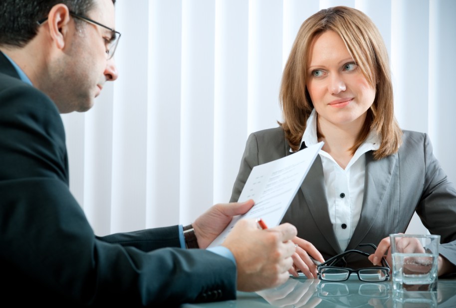 Young woman having a job interview in a office.