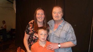 Wife and husband with their child