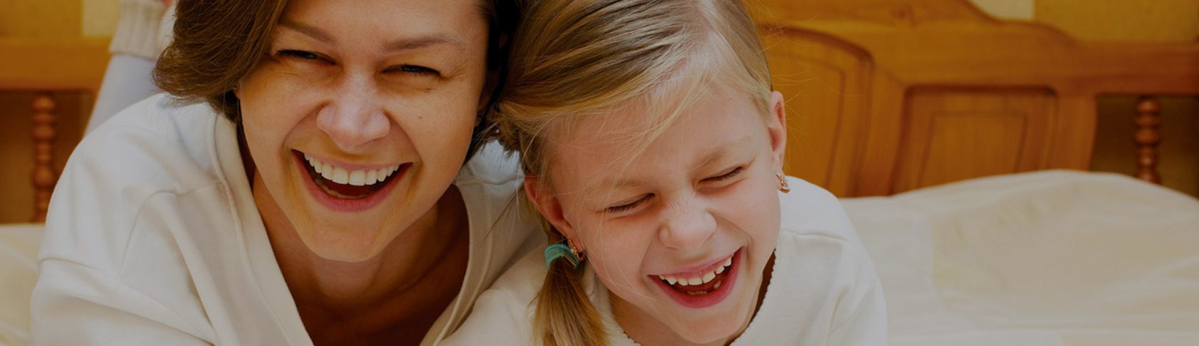 Stock image: A mother with her baby smiling