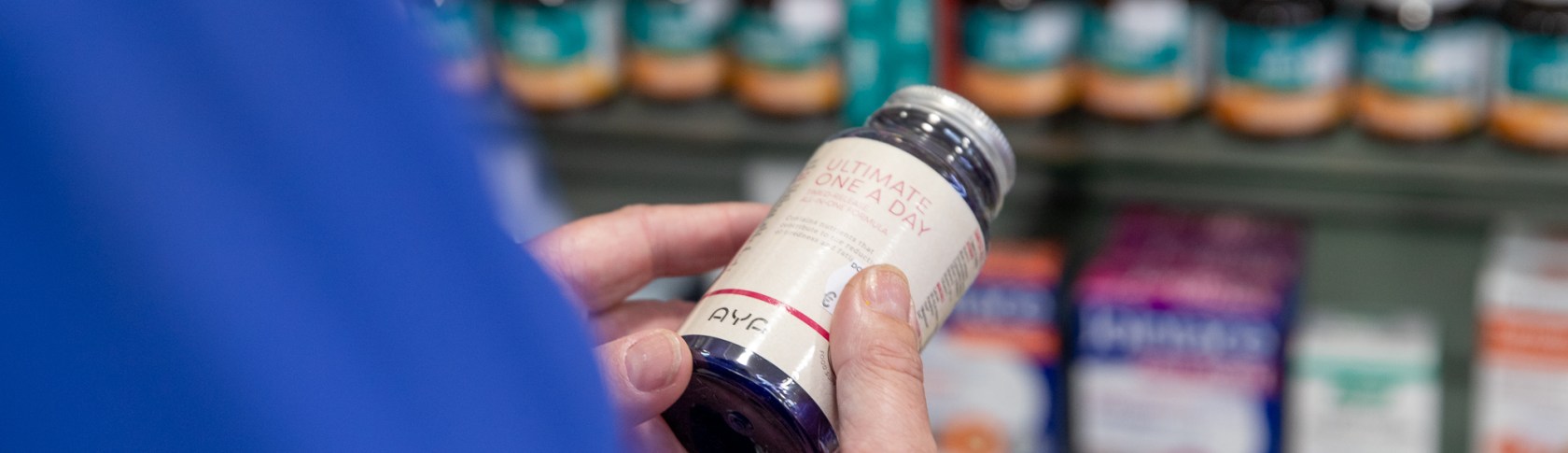 Person looking at medicine label