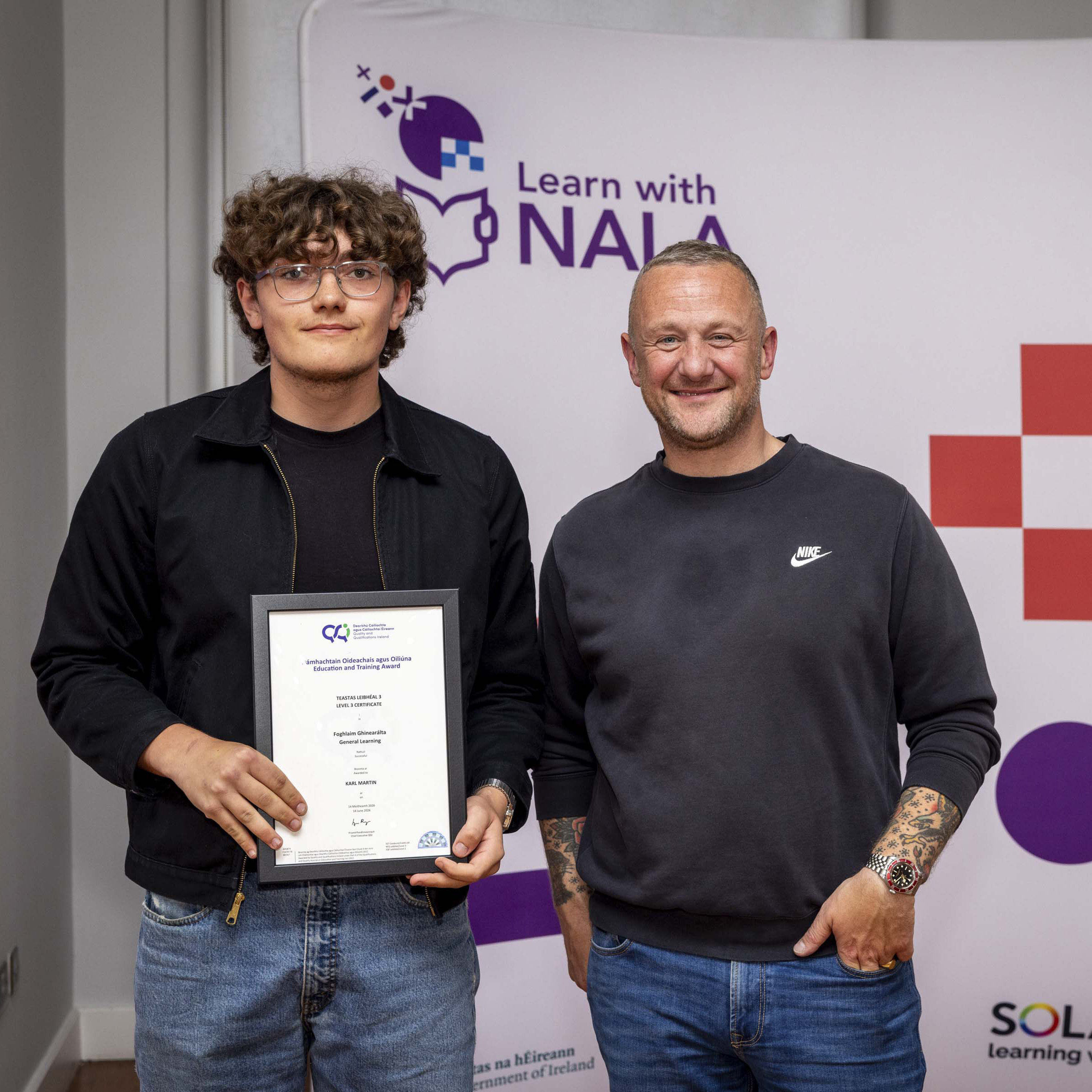Learn with NALA learner Karl receiving his award from PJ Gallagher
